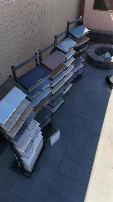Our outdoor paver showroom featuring installed examples, fire pit displays, and sample racks to help you visualize your project.