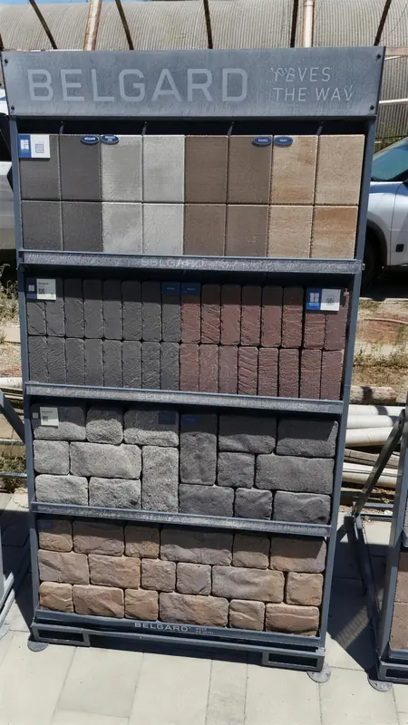 Professional paver display panels showing the full range of available colors, patterns, and finishes for residential and commercial projects.