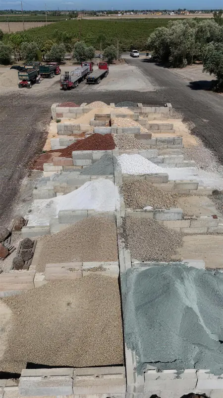 Aerial view of our extensive selection of decorative gravels, featuring a variety of colors and textures to complement any landscape design.